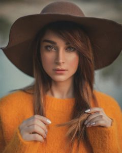 image of pretty woman wearing wide-brimmed hat
